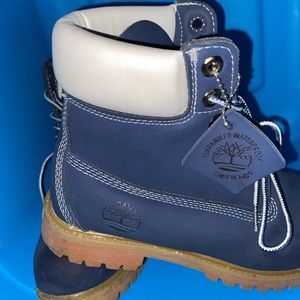 Blue and white Timberlands